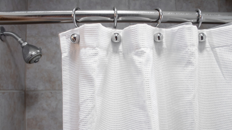 white shower curtain closeup 