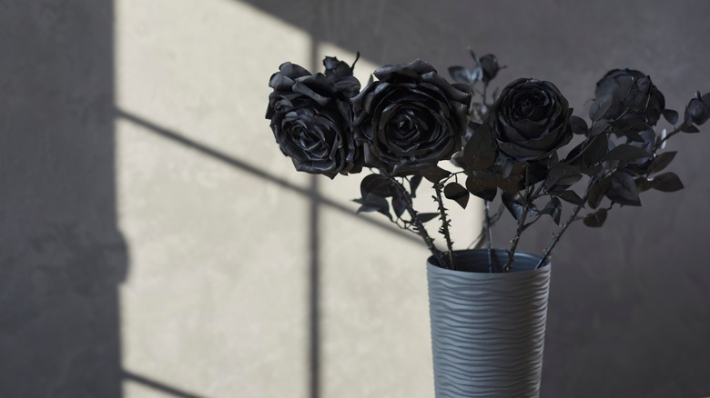 vase of black roses