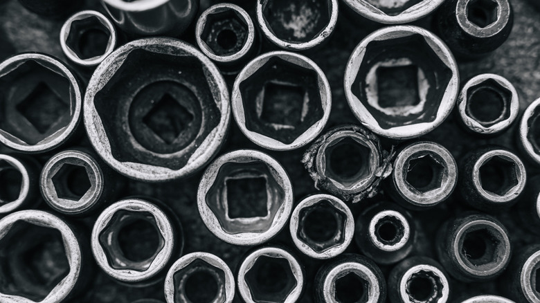 A close-up of various-sized dirty sockets
