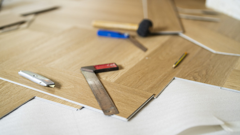 Flooring and installation tools laid out