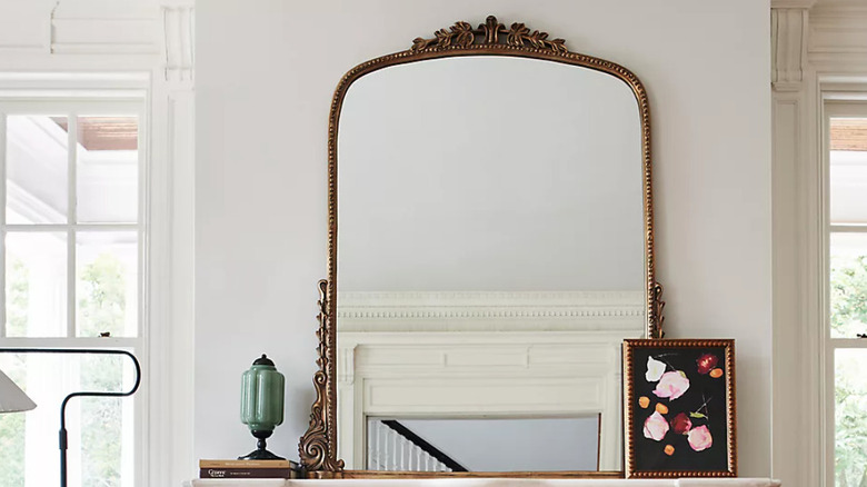 Anthropologie mirror on mantle