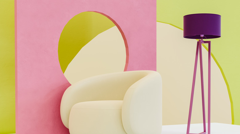 Brightly colored walls and designer white chair