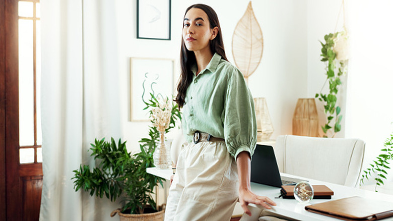 Woman standing at desk