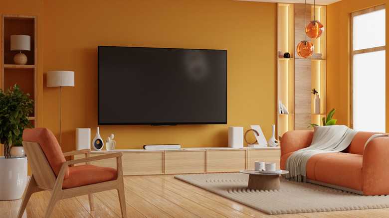 A living room with a large television