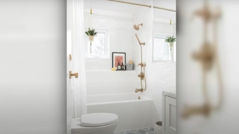 bathroom with shower and bath