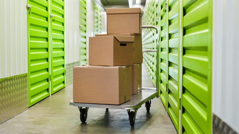 Trolley with boxes, storage unit