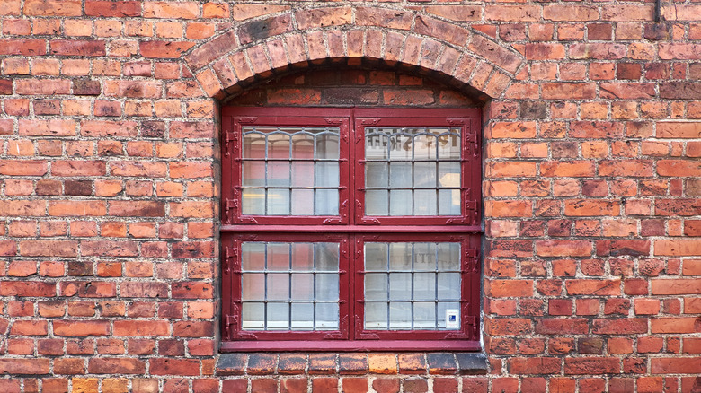 Historical red window mullions muntins