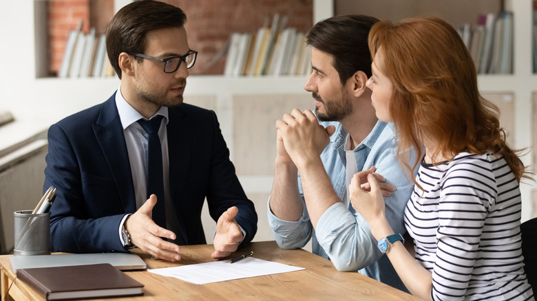 couple discussing home purchase