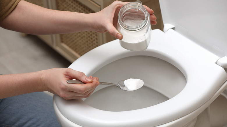 Putting baking soda in toilet