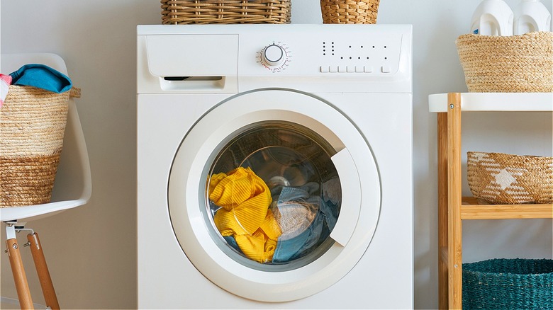 Washing machine with clothes inside