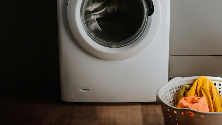 A front load washer with a drain pump access door