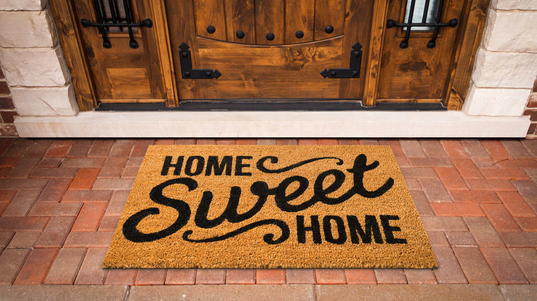 Outdoor doormat on brick entry