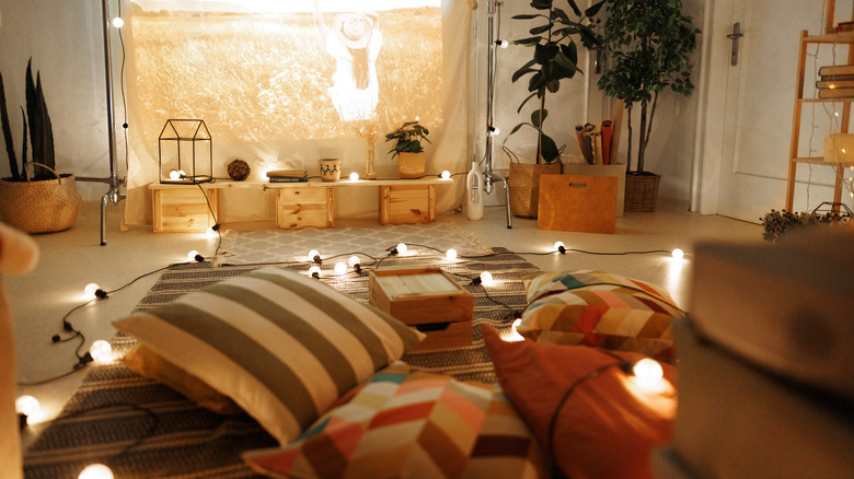 Cozy apartment decorated with floor pillows