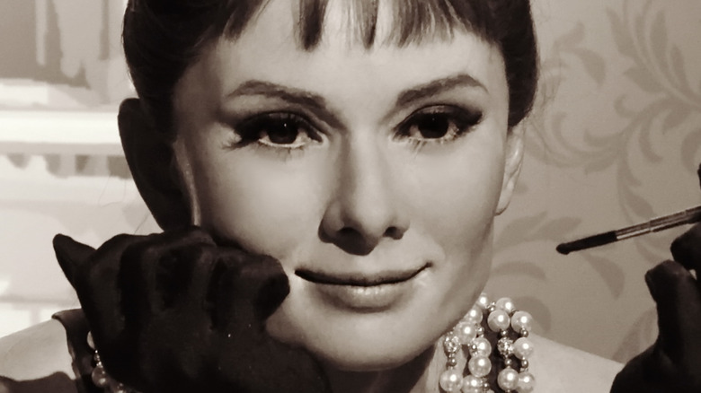 Audrey Hepburn as Holly Golightly