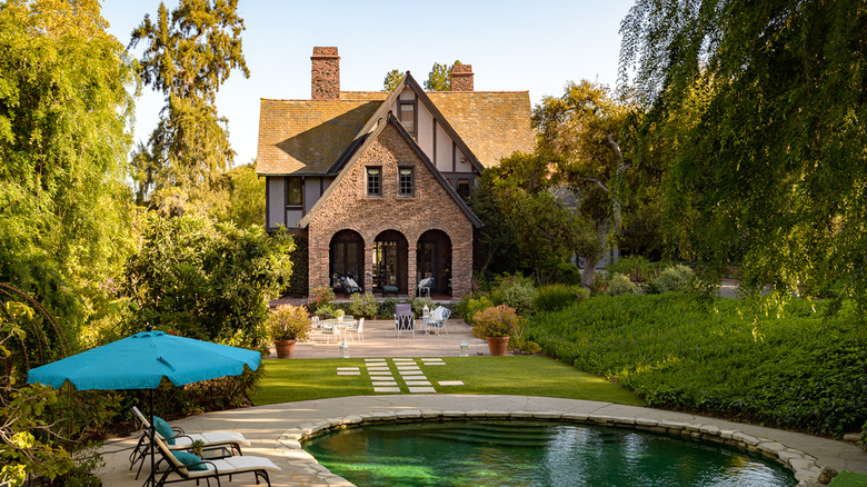 Loggia and stone-ledged swimming pool