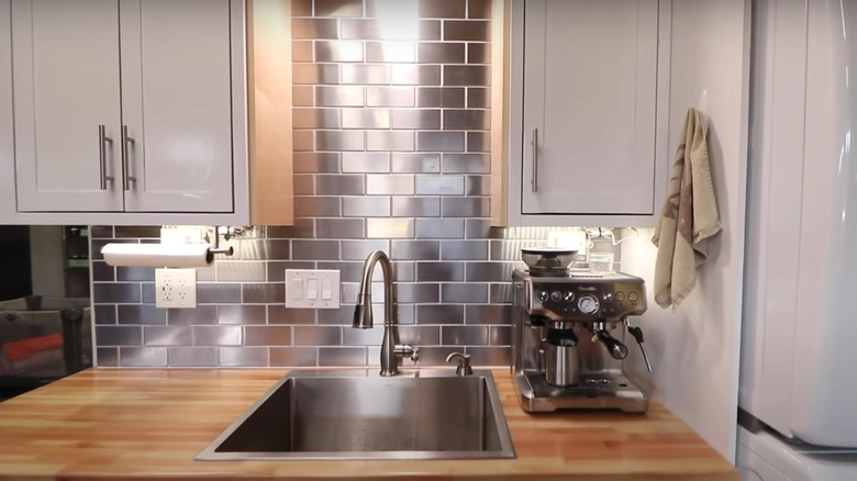 stainless steel sheet on backsplash 