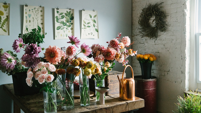 Vases of flowers on a table 
