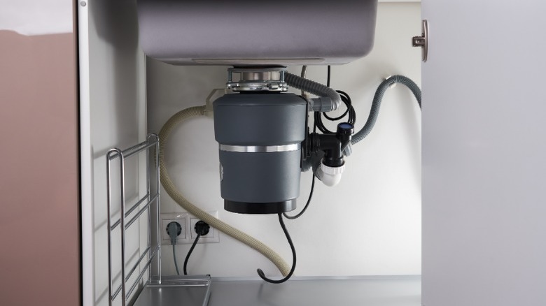 Kitchen garbage disposal under sink 