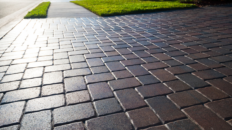 Paver flooring treated with sealant