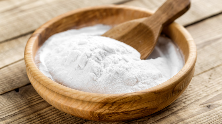 Baking soda in a wooden bowl