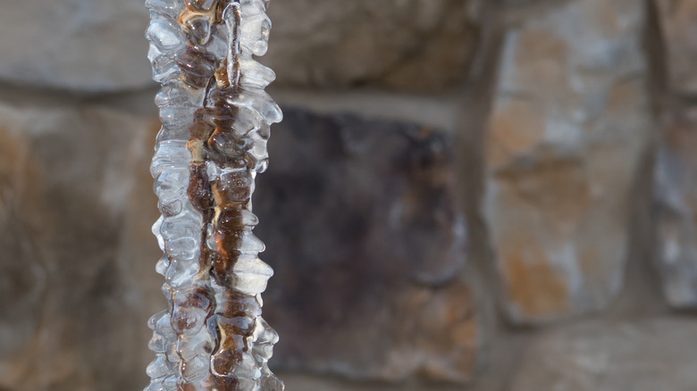 Rain chain frozen in ice