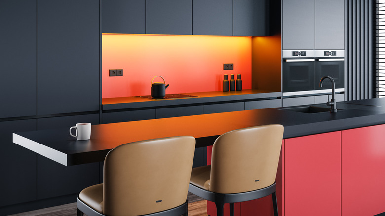 Kitchen with dark minimalist cabinets
