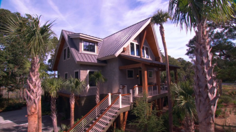 The exterior of 2013's HGTV Dream House surrounded by palm trees