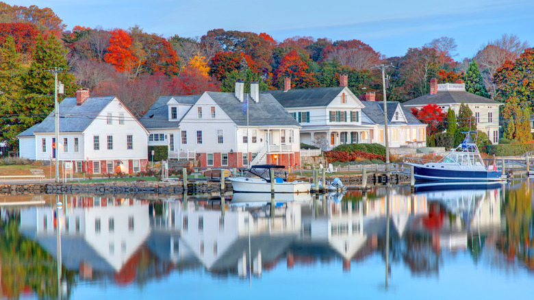 Homes reflecting on the water in Mystic, Connecticut.