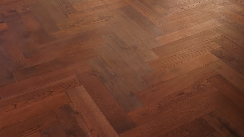 Flooring transformation with herringbone pattern wooden floors