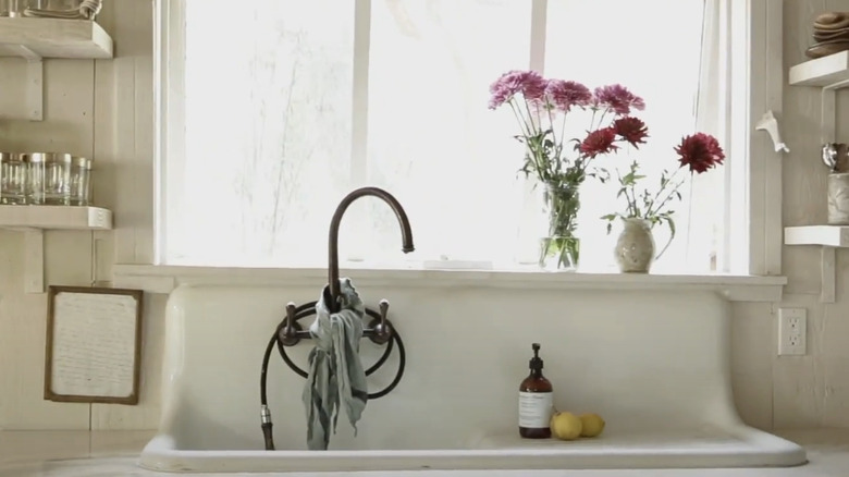 farmhouse sink in bright kitchen