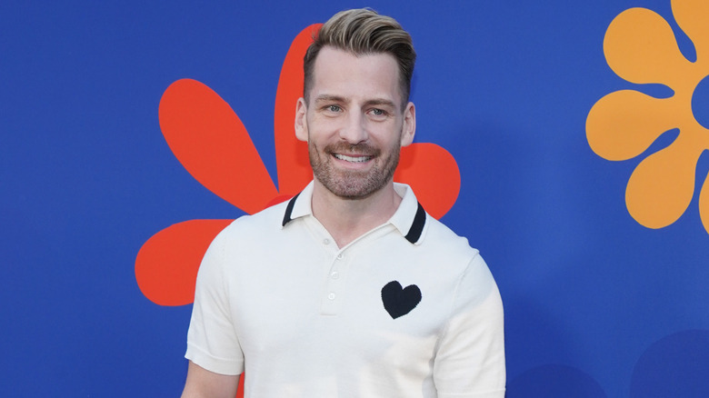 Bright living room with dark walls from "Build Me Up"