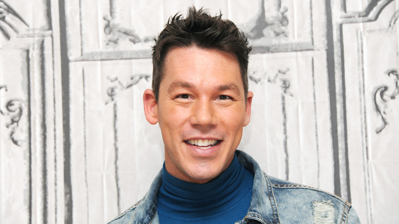 David Bromstad smiles at an event