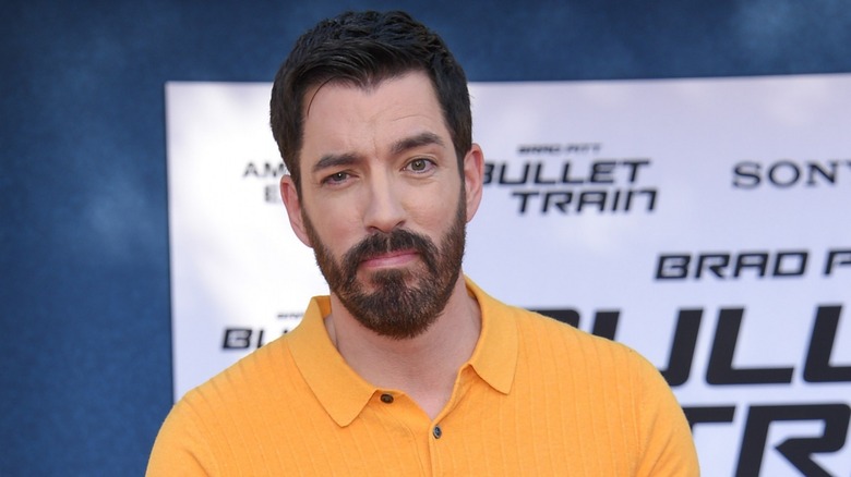 Drew Scott smirking