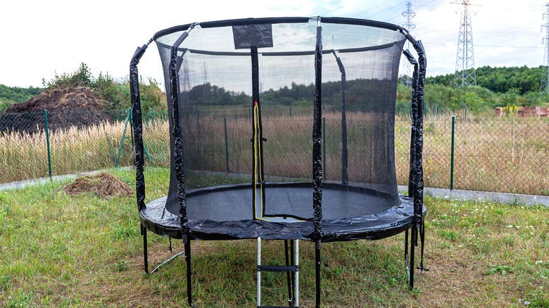 Trampoline in a yard