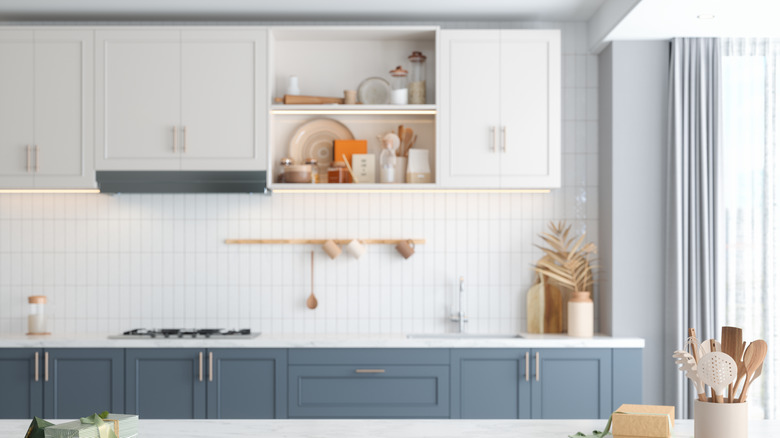 Kitchen with different colored cabinets
