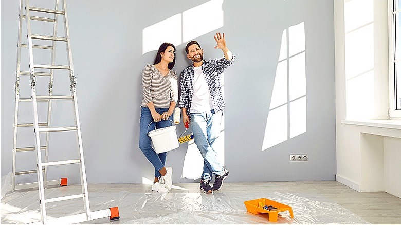 Couple preparing to paint room