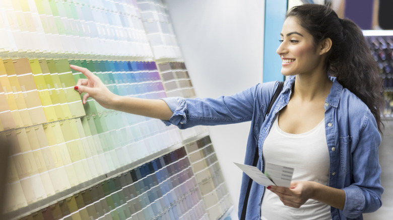 woman shopping for paint