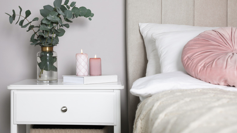 Nightstand with book and candles