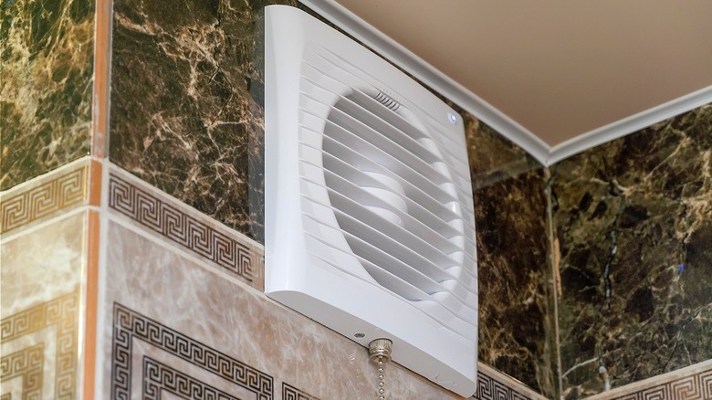 Exhaust fan in tiled bathroom