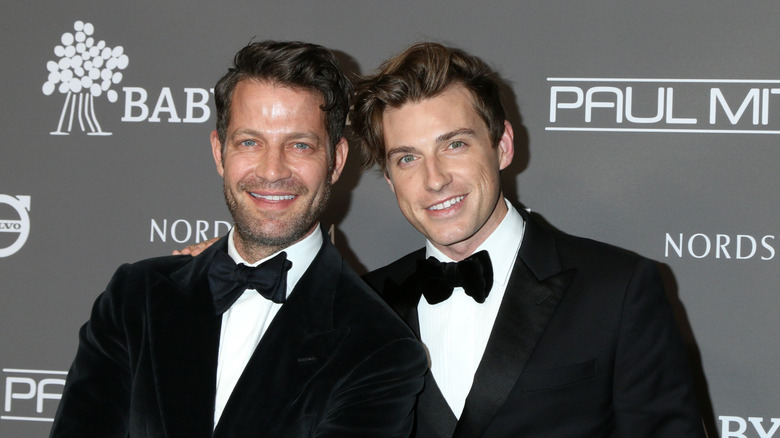 HGTV's Nate Berkus and Jeremiah Brent pose together at a celebrity event.