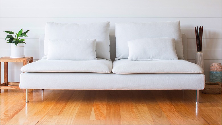 White armless sofa