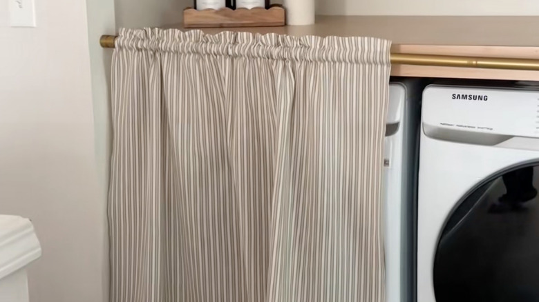 Curtain over washer and dryer