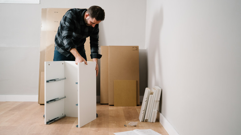 Someone building IKEA furniture