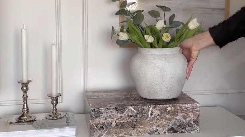The finished console box covered in marble contact paper