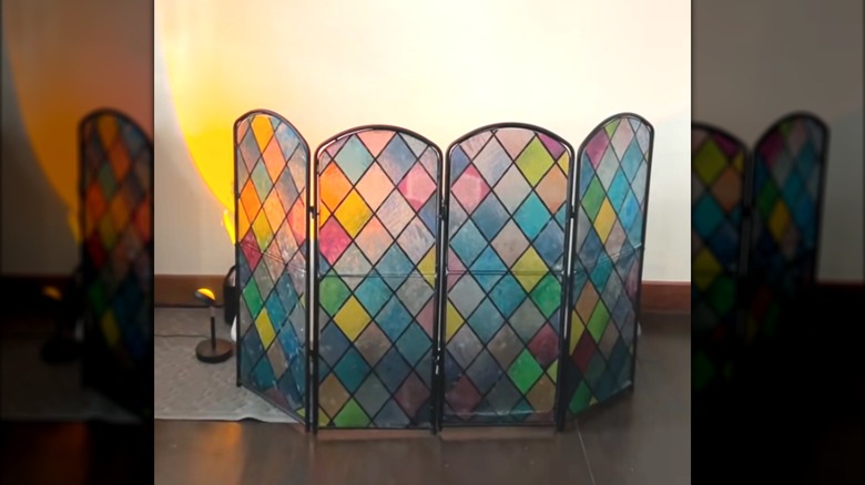 An artsy DIY cat litter box screen