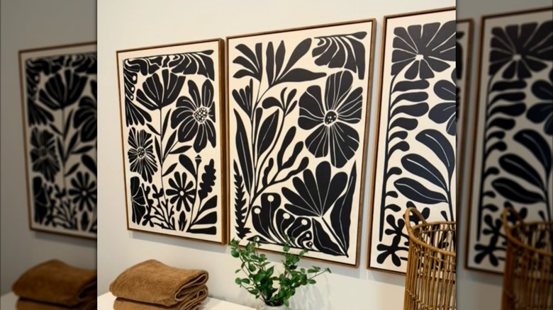 Photo of a framed poster hiding a breaker box