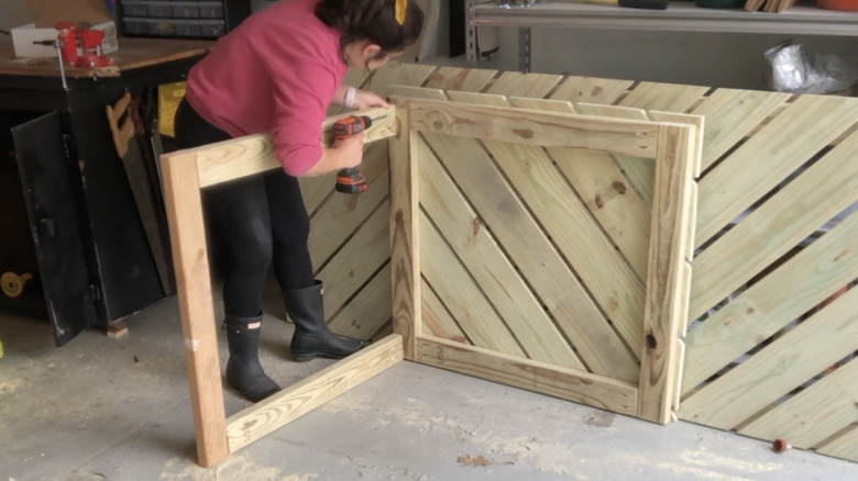 Building the wooden frame to hide the eyesore of utility boxes