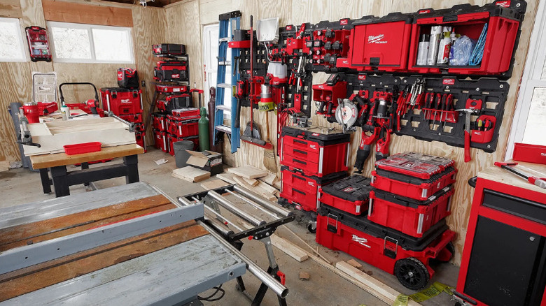 A workshop wall organized with Milwaukee's Packout storage system