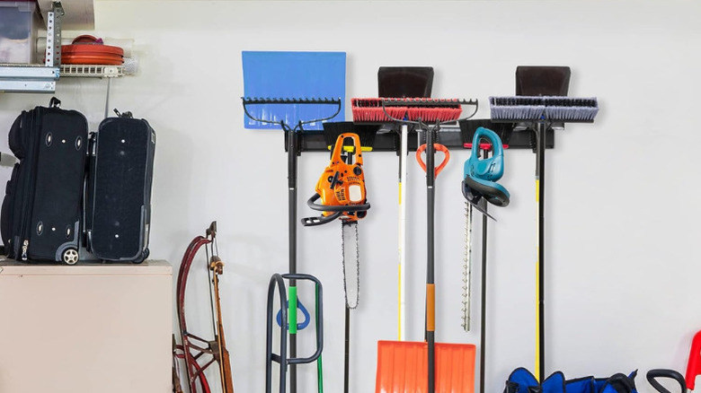 Right Hand's 8-Piece Wall-Mounted Tool Storage Rack with various tools hung from it