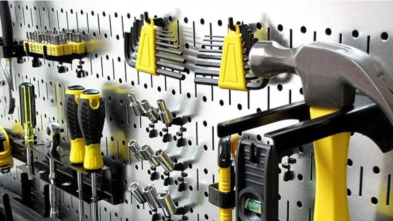 Close-up of tools hung on a Wall Control pegboard